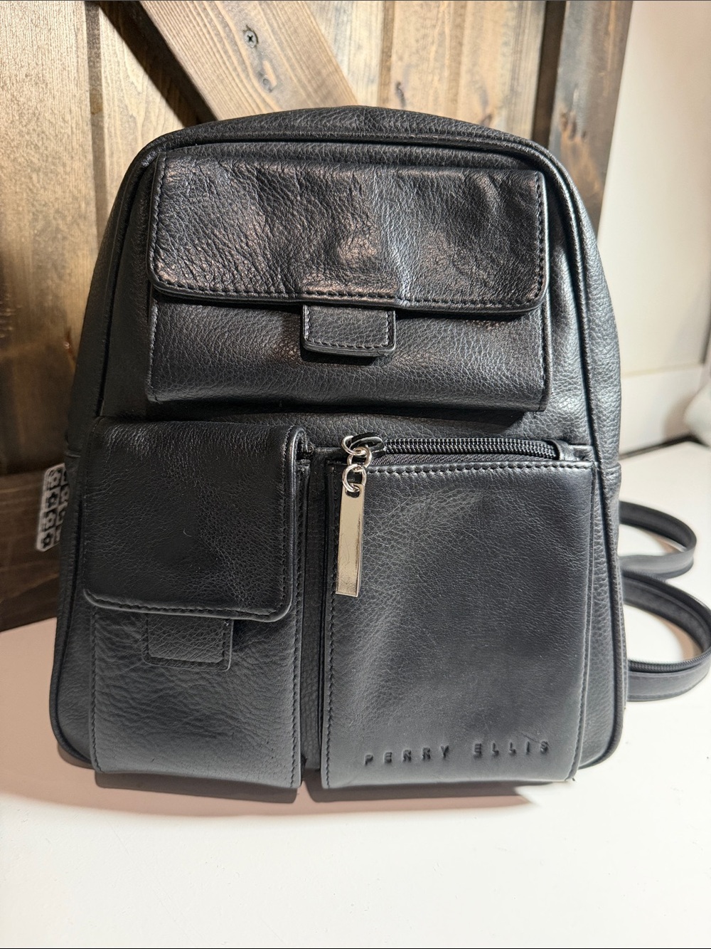 Perry Ellis Black Leather Compact Multi-Pocket Backpack
